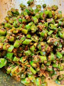 Mauritian Green Chili Achard ingredients in a pan.