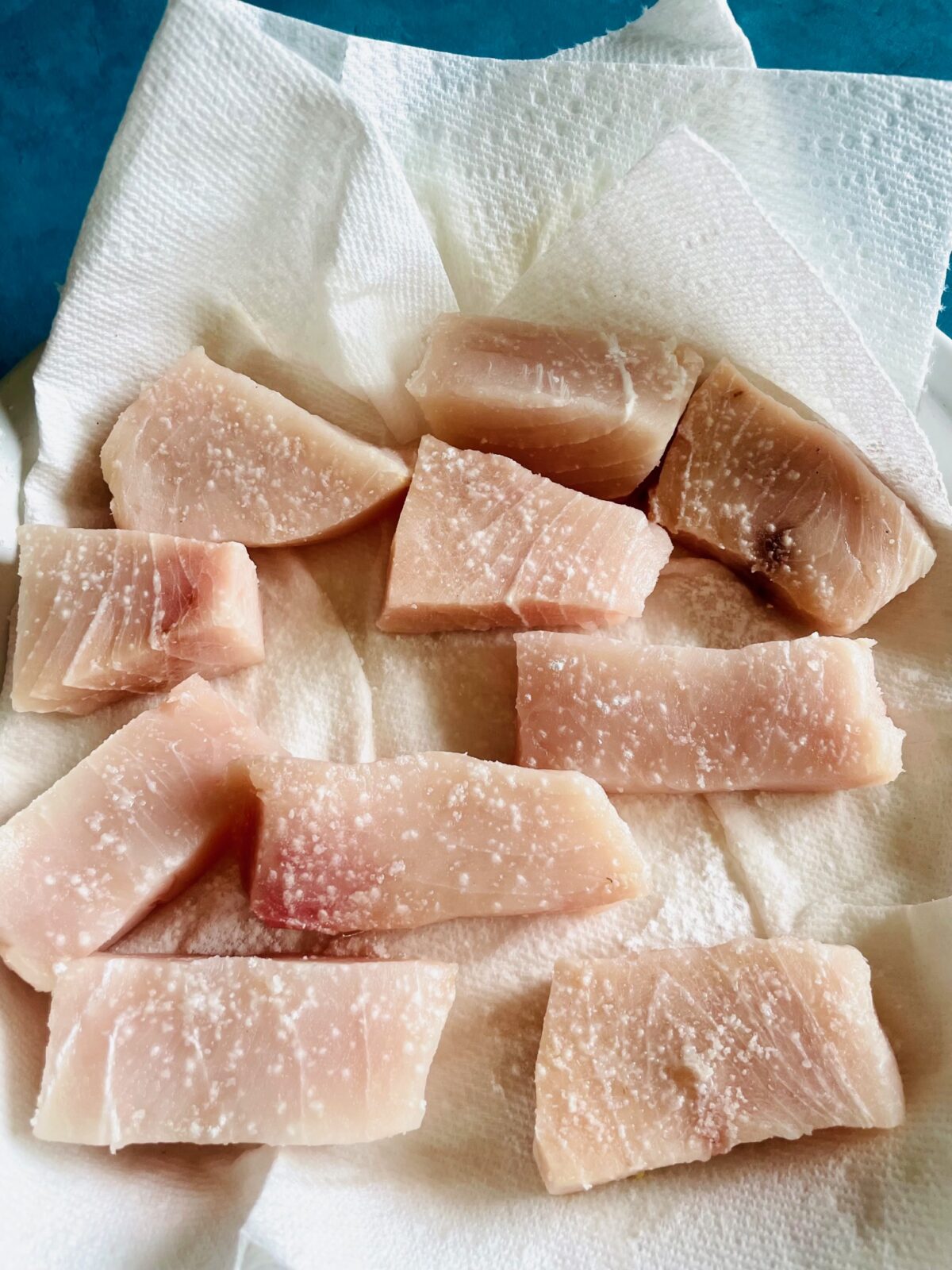 Swordfish pieces for vindaye sprinkled with cornstarch