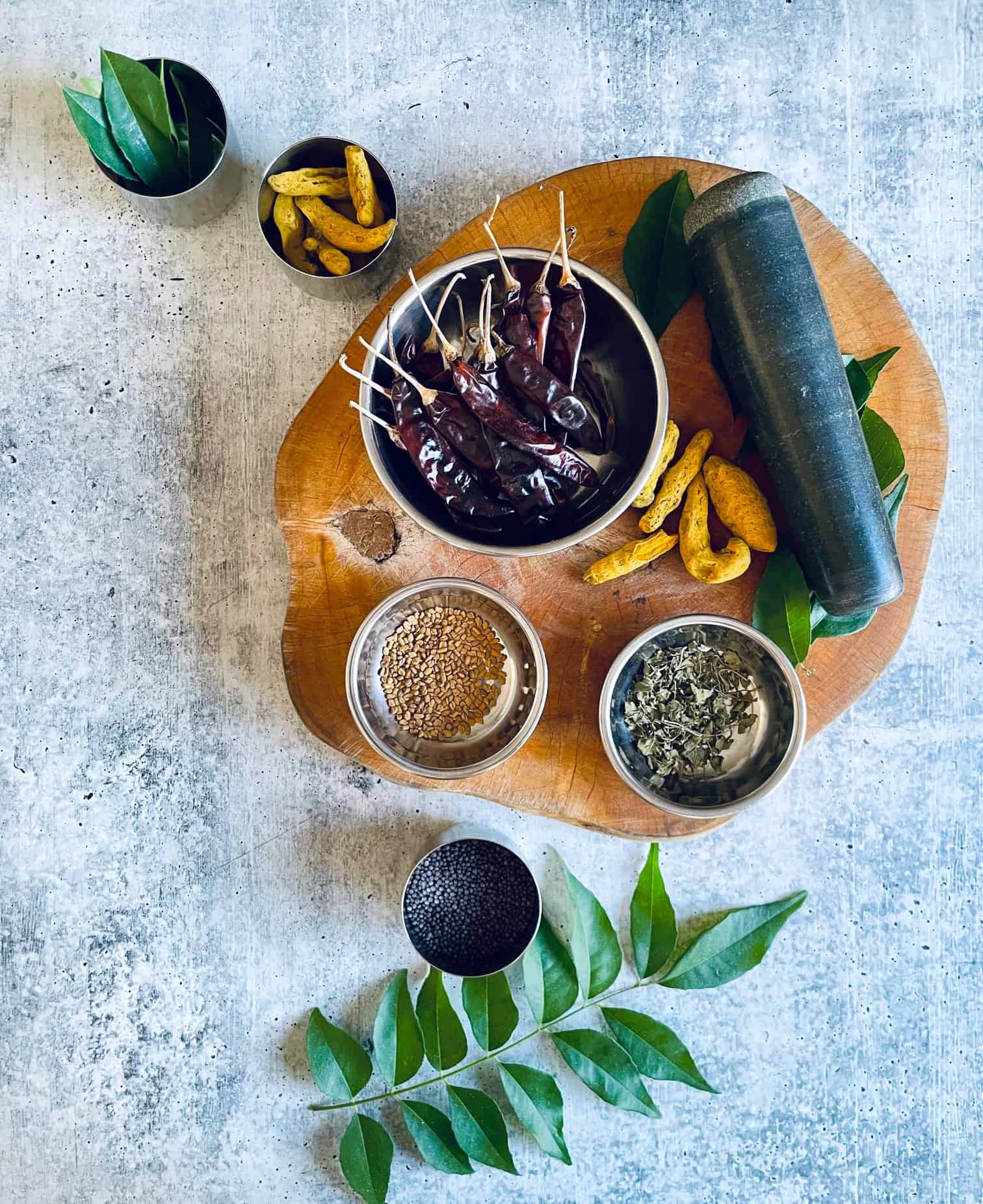 Mauritian Achard Masala Paste Ingredients on wood chopping board.