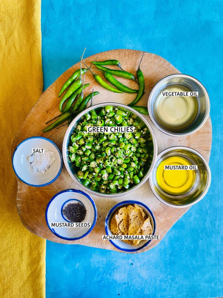 Mauritian Green Chili Achard ingredients on wood chopping board