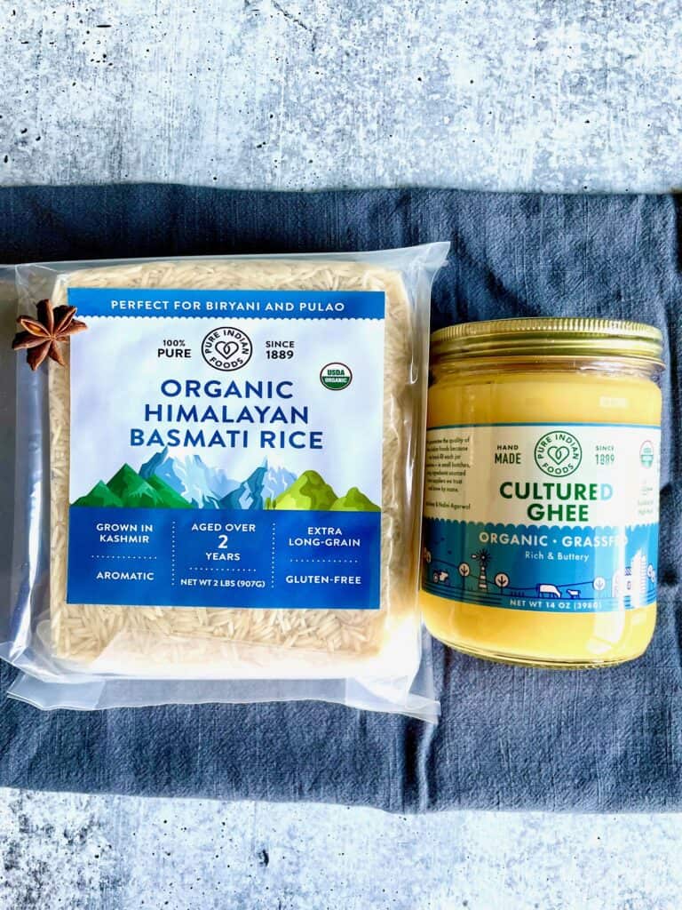 Pure Indian Foods Himalayan basmati rice and cultured ghee over blue towel