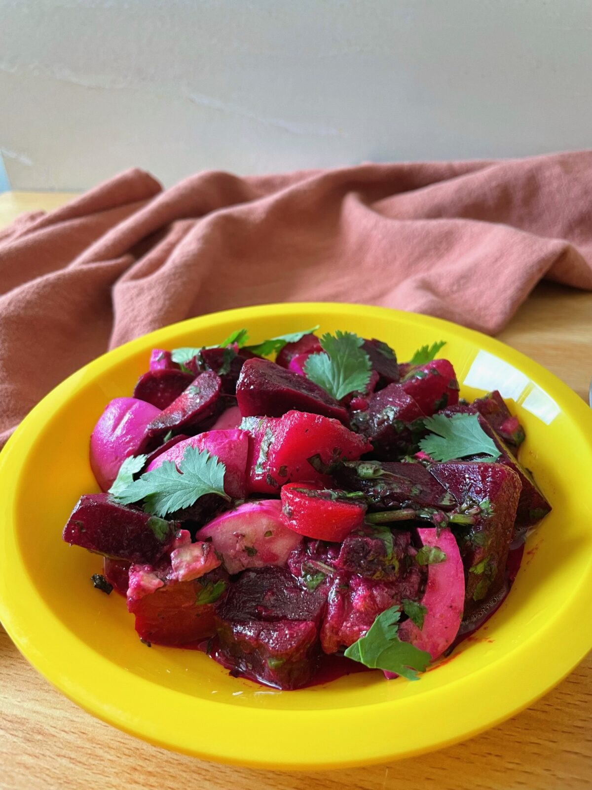 Simple Beet and Potato Salad in a yellow plastic plate