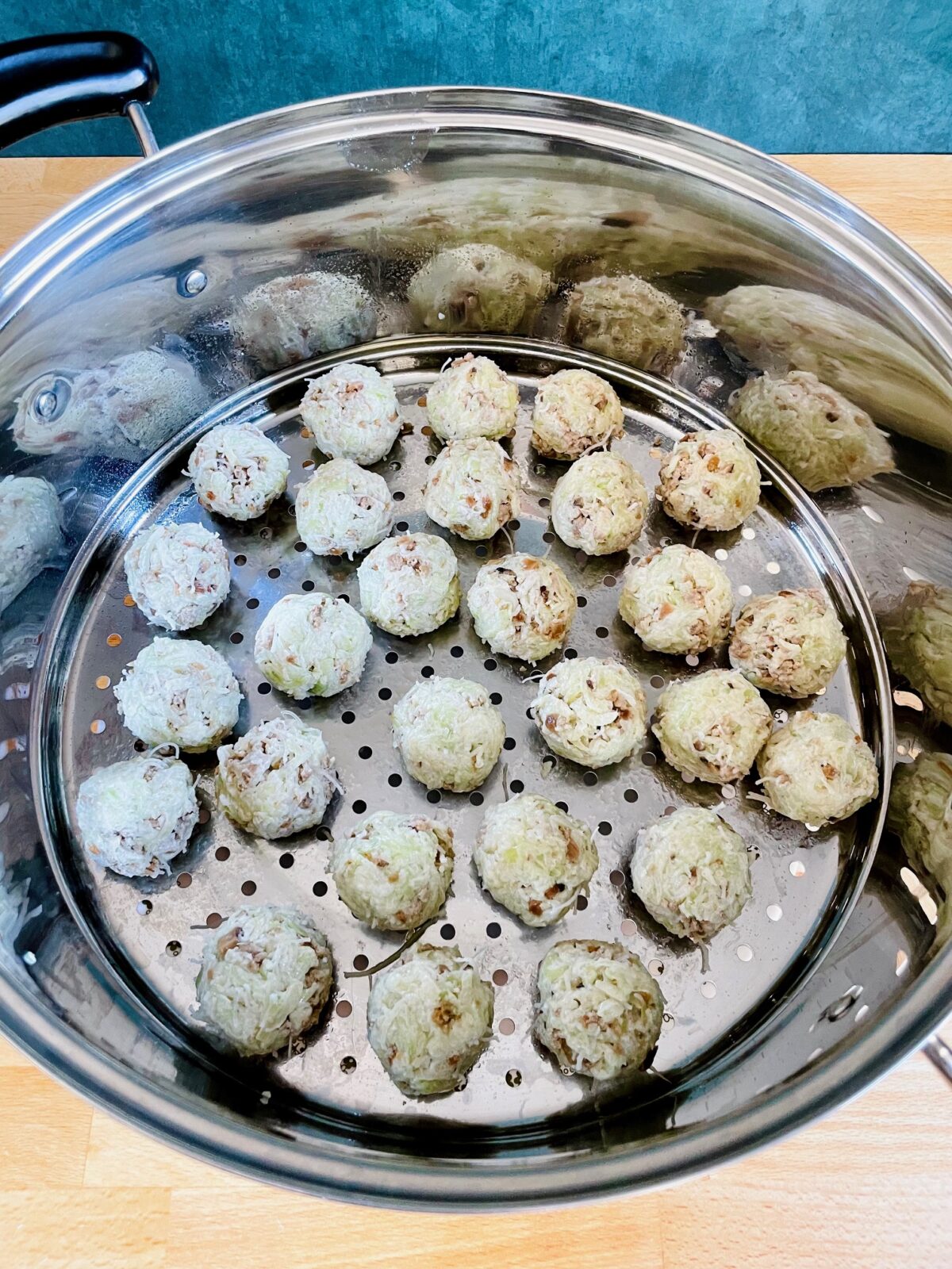 Chinese chayote squash dumplings in steamer - to be steamed.